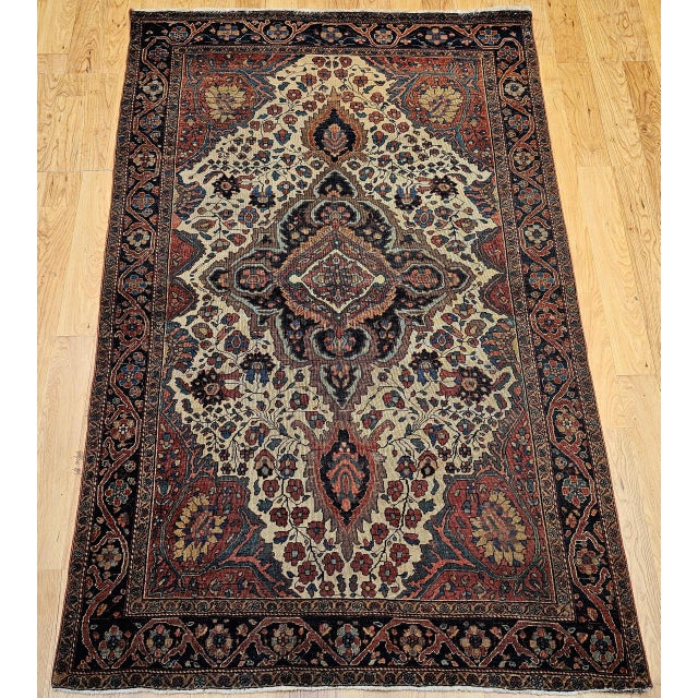 "An exceptional late 19th century Persian Farahan Sarouk area rug, finely woven with a sophisticated Persian Garden design...