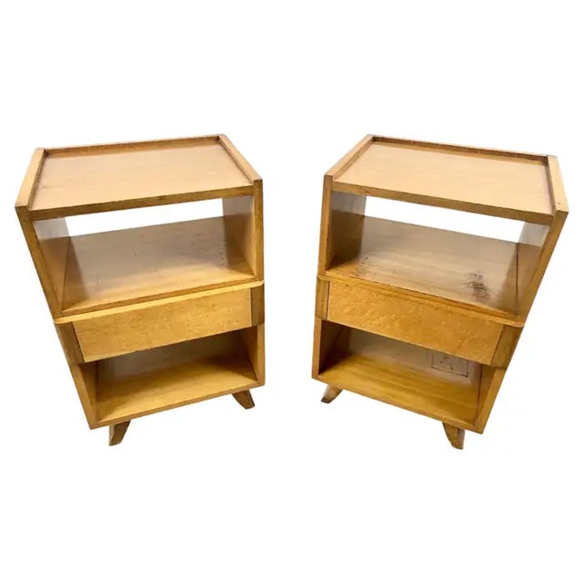 A stylish pair of Mid-Century Modern nightstands by R-Way, crafted in warm-toned birdseye maple. These elegant bedside...