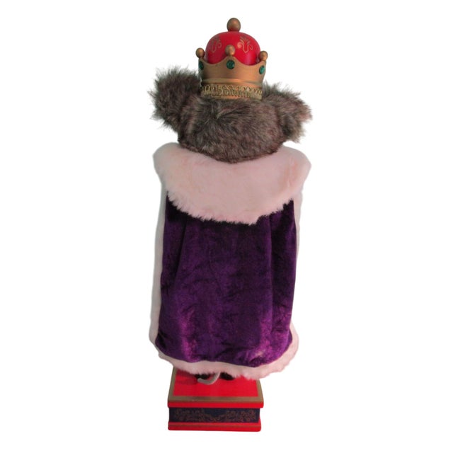 This elegant nutcracker, standing about 24 inches tall, features exquisite detailing and a regal design. It's a unique...