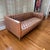 Crate & Barrel Rollins Leather Sofa Luxurious top-grain leather brings a clubby feel to this mid-century inspired Rollins...