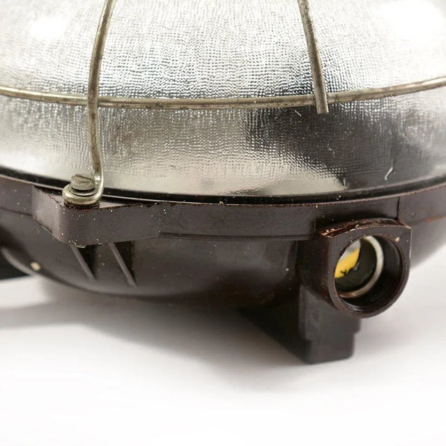 - Industrial wall/ceiling light - Made in former Czechoslovakia, 1950s - Originally used as a factory light - Bakelite...