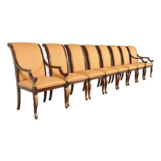 Baker Furniture Style Regency Carved Mahogany and Gold Gilt Dining Chairs, Set of Eight For Sale