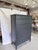 A refined Ethan Allen tall chest featuring a crisp transitional silhouette and an elegant matte black finish that gives...