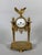 Empire period portico clock with Egyptian motifs, gilt bronze, circa 1800, 19th century For Sale