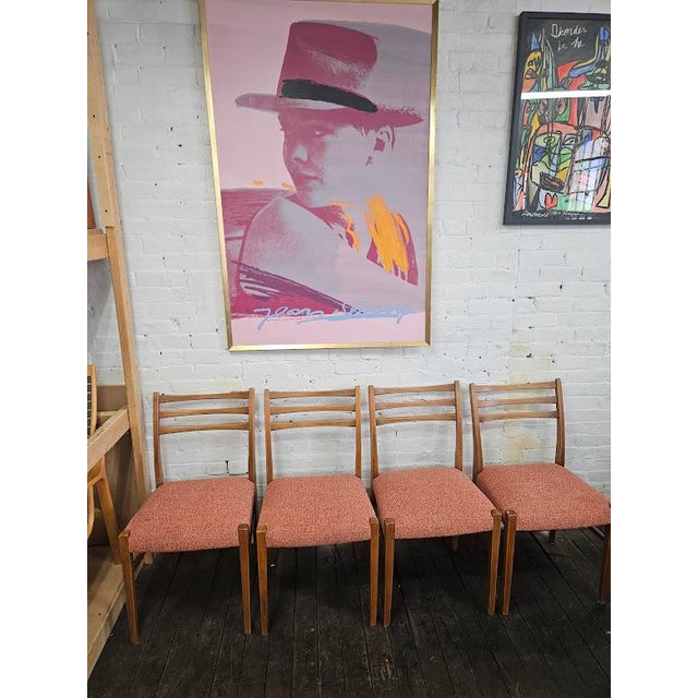 This set of danish dining chairs have beech frames and have been newly reupholstered in a Knoll Textiles Italian Boucle...