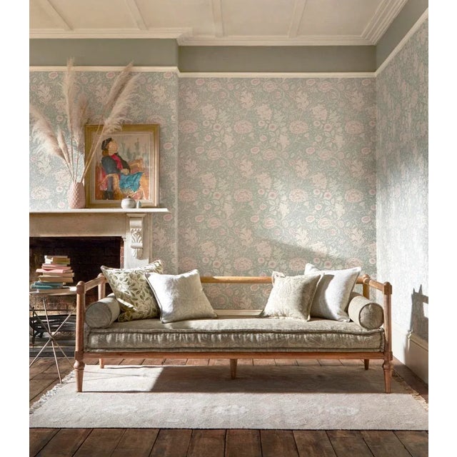 Scrolling acanthus leaves and abundant blooms feature in this beautiful Morris & Co. wallpaper taken from our archive....