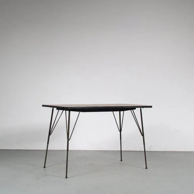 This highly recognizable table by Rudolf Wolf is an iconic piece of Dutch industrialism. Manufactured by Elsrijk in the...