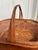 A beautifully handwoven vintage bamboo gathering basket retaining its original Hunan Products “Made in China” label....
