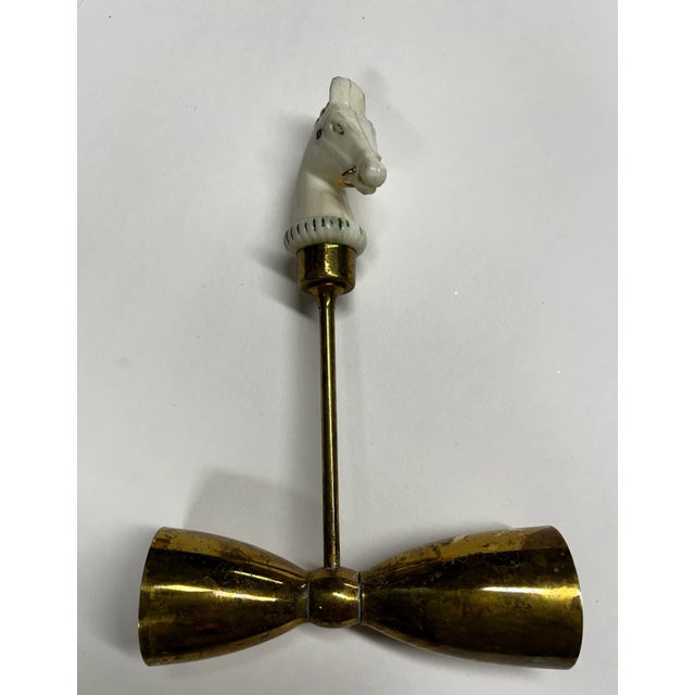Mid-century brass and bakelite set with horse heads. Double shot tool, mixing spoon, and fork.