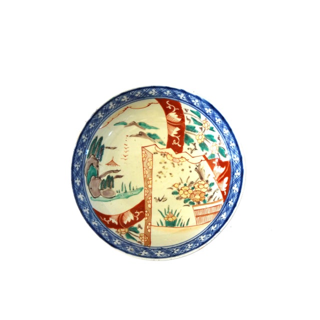 An antique 17th- or 18th-century Kangxi Period (or the Qing Dynasty) Chinese Export Porcelain Bowl. Heavily potted...