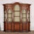 1920's Italian walnut bookcase/ display cabinet in the 18th century style. This piece is designed in the style of the...