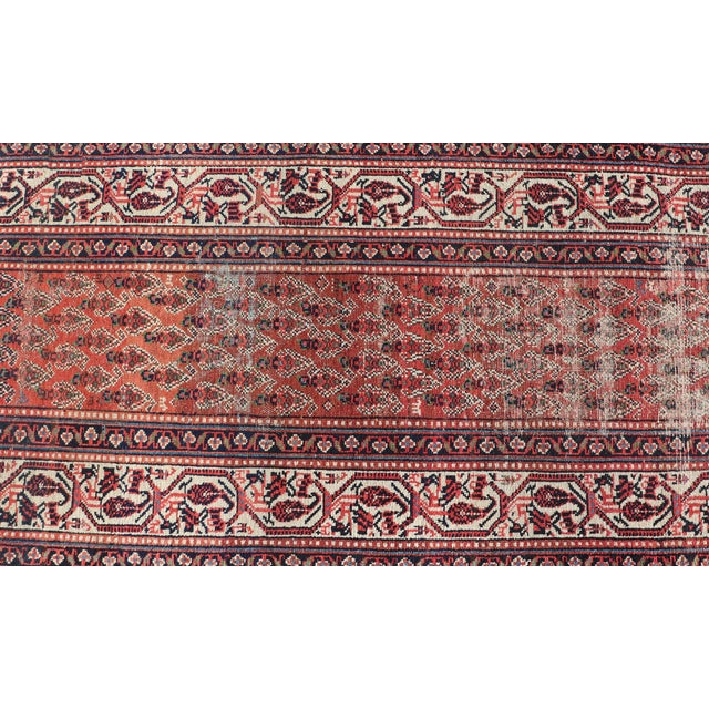 Distressed Antique Persian Malayer Runner With Field of Paisleys Design in Red 3'2"x15'2" For Sale - Image 10 of 12