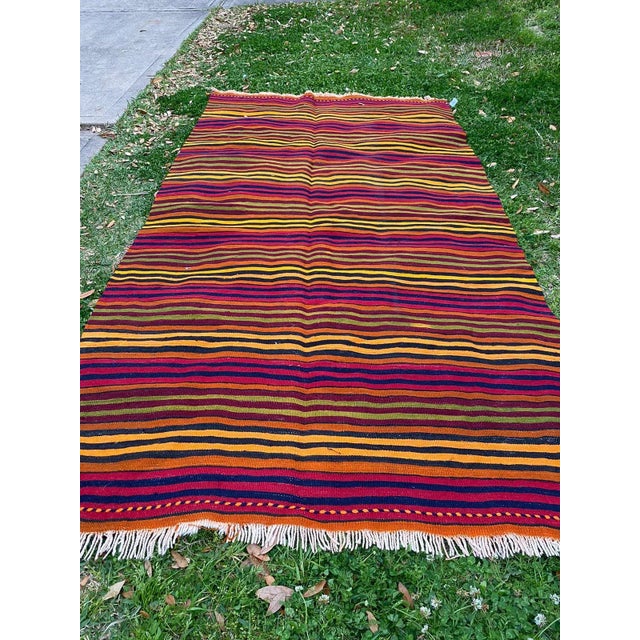 All rugs have been professionally cleaned; original condition is not altered, age-related wear is considered normal in...