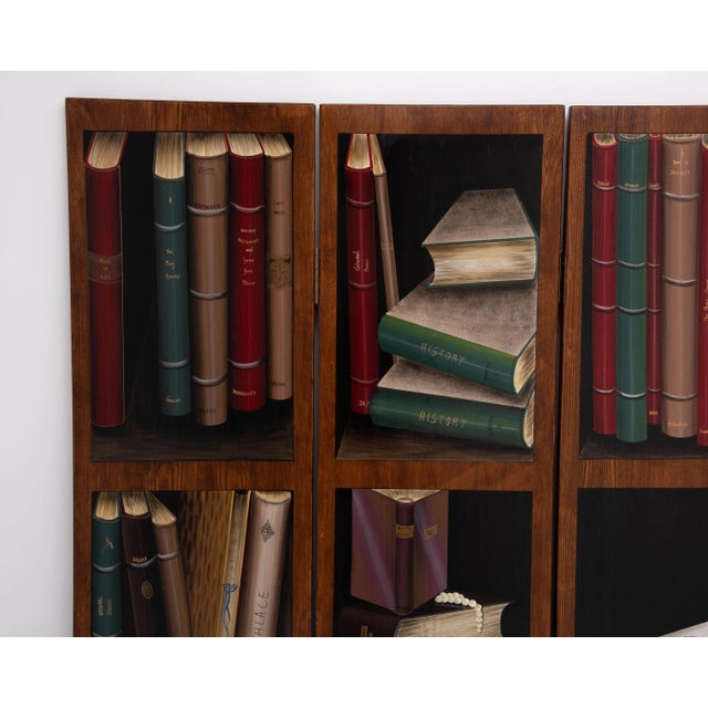 A Trompe L''Oeil style room divider depicting painted vintage library and book vignettes on a single side of one inch deep...