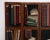 A Trompe L''Oeil style room divider depicting painted vintage library and book vignettes on a single side of one inch deep...