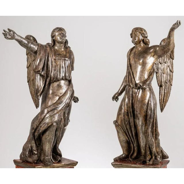 Central italy school pair of sculptures from the louis xiv era "angels" late 17th century in carved and silver lacquered...