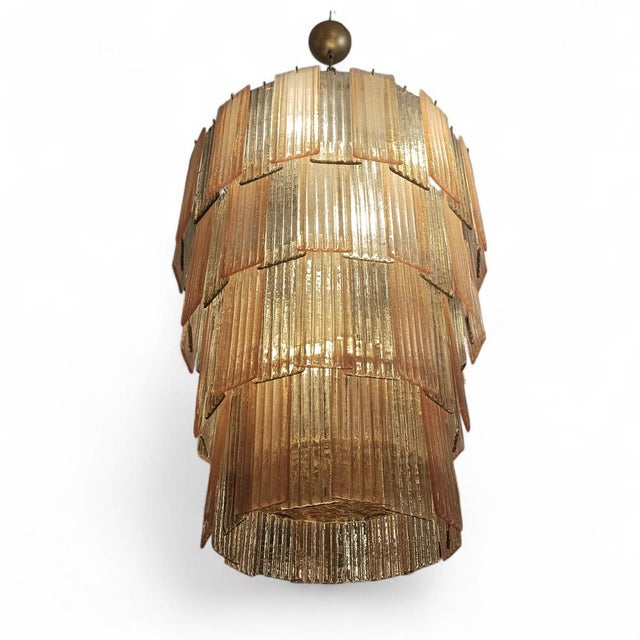 A large Venini lamp, a design by the Italians from the 1960s. The lamp features a gold-plated, powder-coated steel frame...