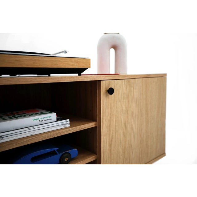 small chest of drawers, which was created for lovers of gramophones and vinyl records. The width of this piece of...