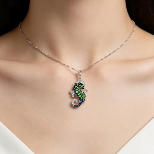 Brand: EFFY Material: 14K White Gold - durable and elegant Main Stones: Tsavorite and Sapphires - natural gemstones Accent...