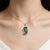 Brand: EFFY Material: 14K White Gold - durable and elegant Main Stones: Tsavorite and Sapphires - natural gemstones Accent...