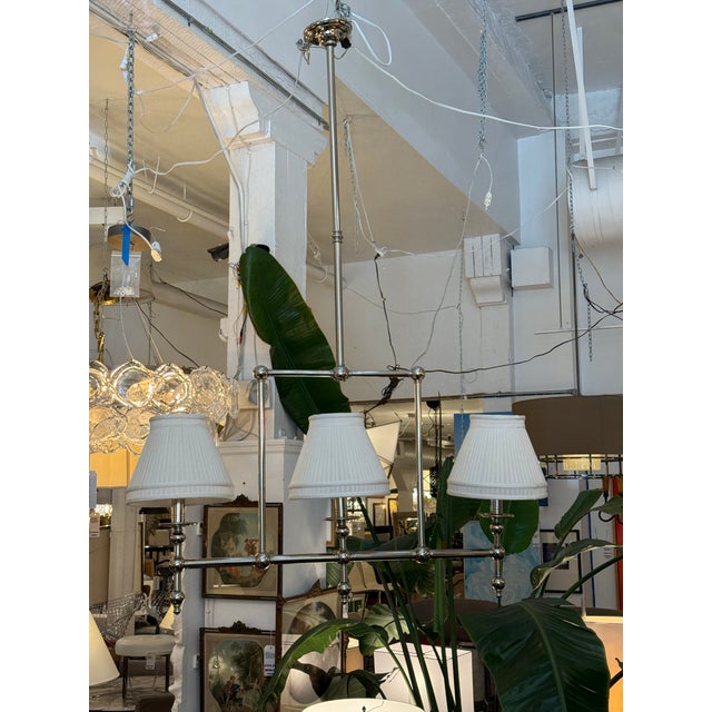 Design Plus Gallery presents a Unique Chandelier of Custom Design. The fixture has three separate pendants attached to a...