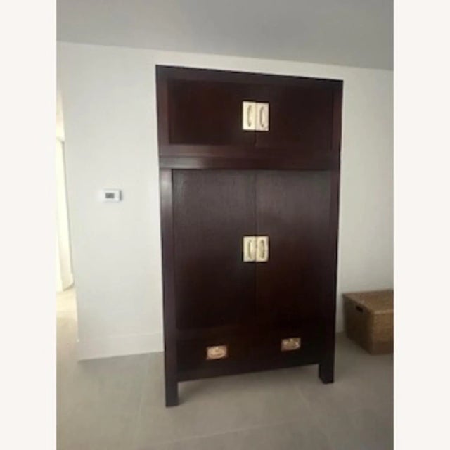 "Beautifully crafted media cabinet and armoire, designed by Thomas O'Brien for Hickory Chair, brings sophistication to...