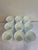 A charming set of nine vintage white milk glass tumblers featuring an embossed grape and vine motif. Raised clusters of...