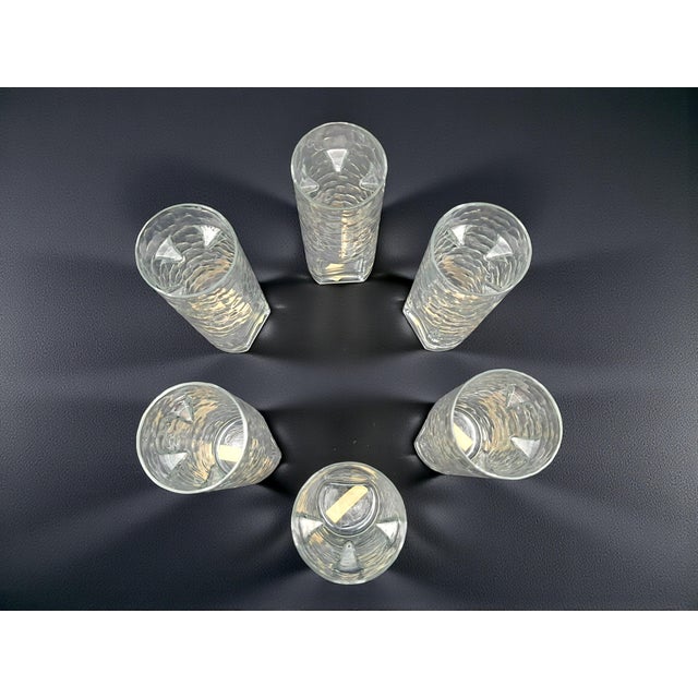Bring a touch of sophisticated Italian design to your home bar with this stunning set of 6 highball glasses, a true...