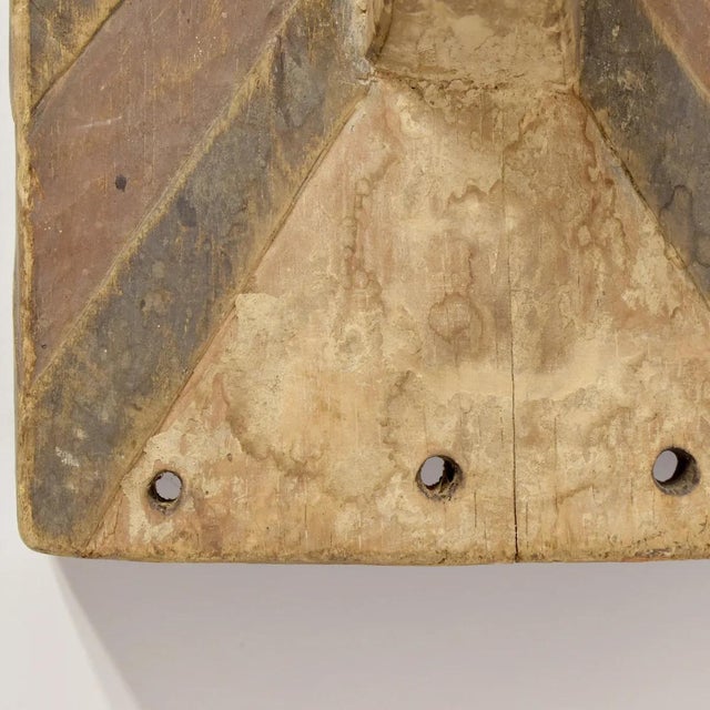 The Songye Kifwebe Mask was hand-carved by the Songye people in the southeastern part of the Democratic Republic of the...