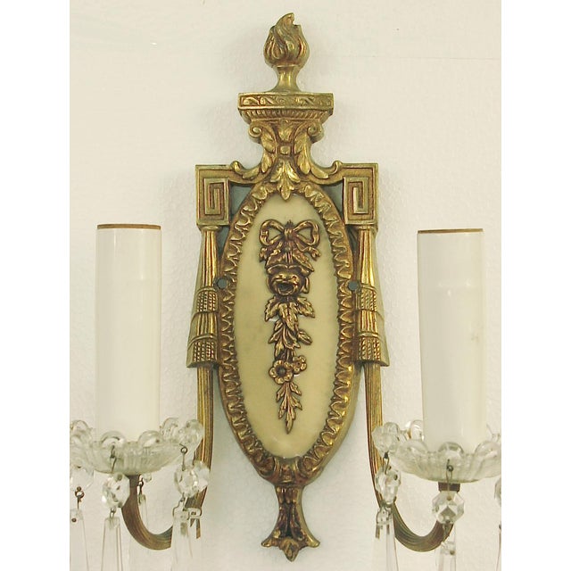 Offering a fine AMERICAN pair of wall sconces possibly as old as the 1930s, in the French style. They're extremely well...