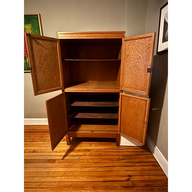 This beautiful Antique Arts and Crafts wooden cabinet blends timeless craftsmanship with practical storage. Handcrafted...