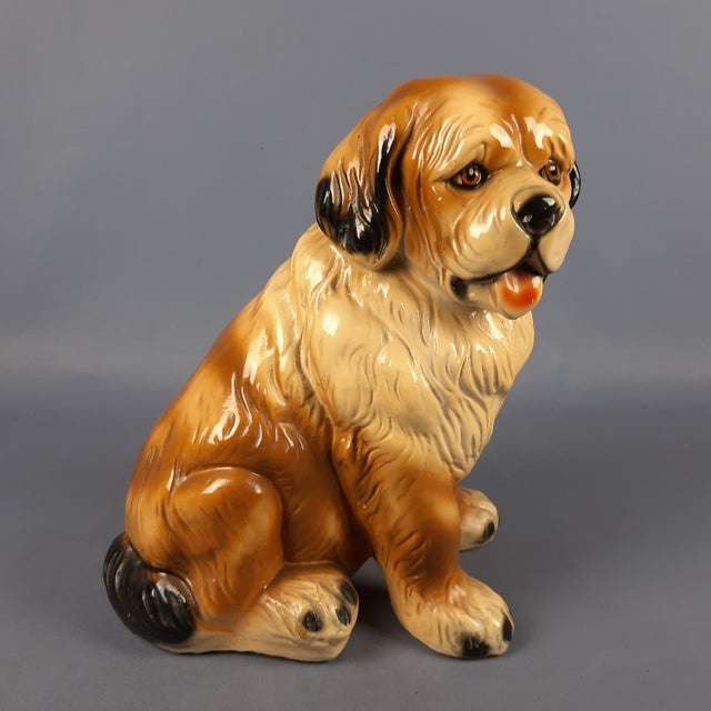 Wonderful vintage majolica plaster sculpture depicting a large, light brown St. Bernard dog. Excellent Italian...