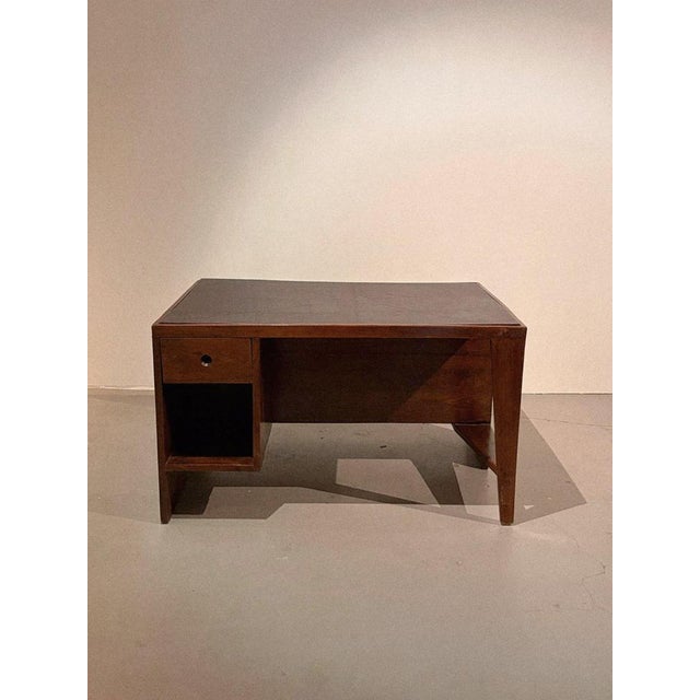 This iconic original PJ-BU-02-A / Pigeonhole desk in teak by legendery designer Pierre Jeanneret. Dark brown re-covered...