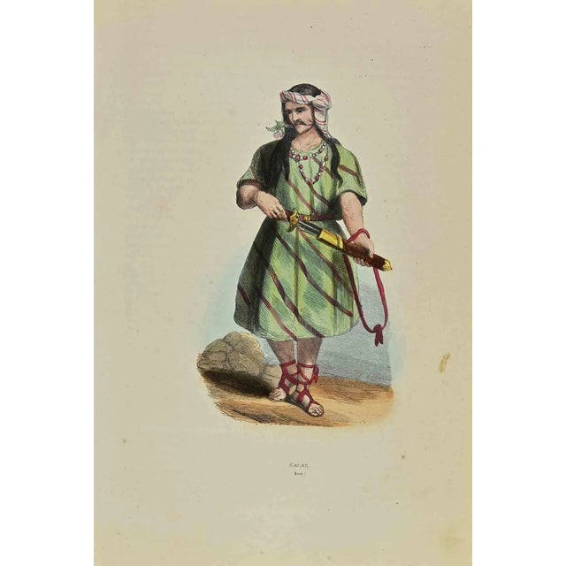 Karian is a lithograph made by Auguste Wahlen in 1844. Hand colored. Good condition. At the center of the artwork is the...