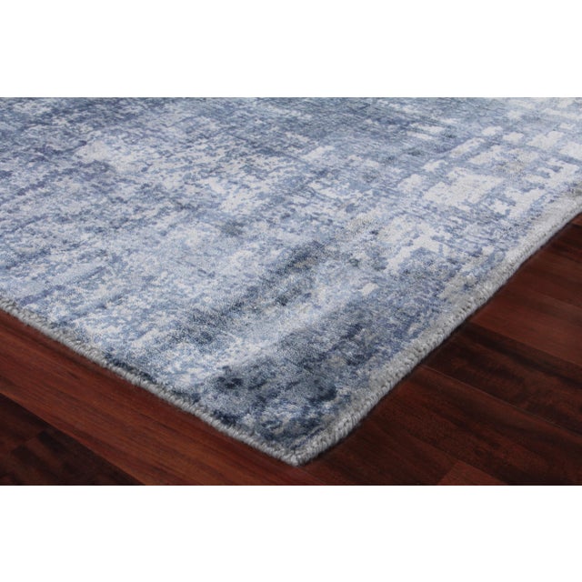 Subtle yet rich colors combine with beautiful abstract designs. Handmade from the luxurious bamboo silk, our Luton...
