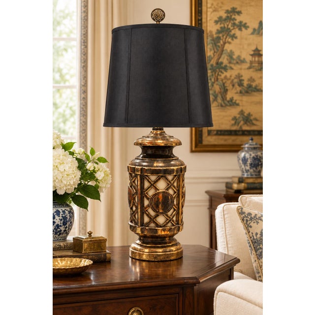 TITLE Monumental Weathered Chinoiserie Lighted Ceramic Table Lamp with Black Shantung Shade DESCRIPTION A monumental...