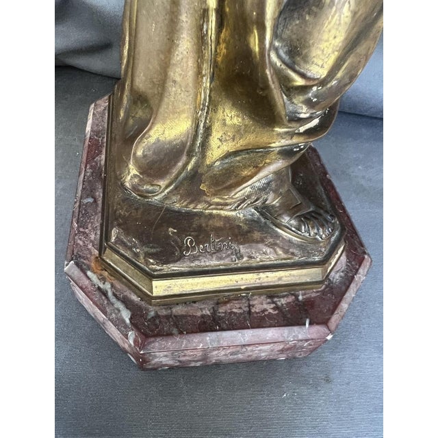 Sculpture of Saint John the Evangelist, signed by Bertini. Bronze sculpture, late 19th century. Total height: 47.5 cm....