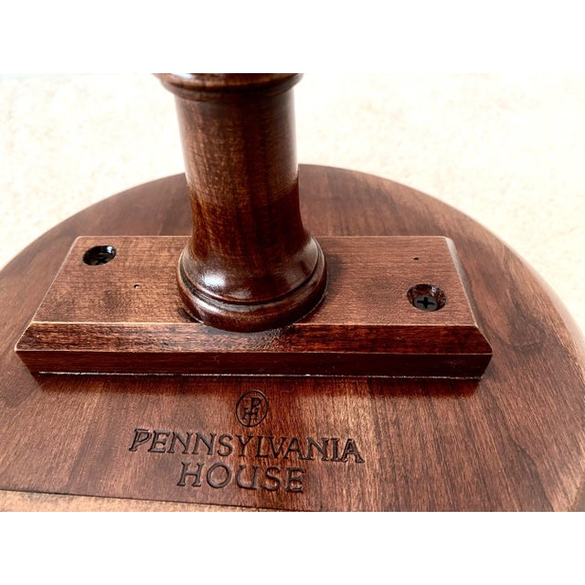 Late 20th Century Pennsylvania House Solid Cherry Accent Stand/Plant stand. All three feet on the tripod base of this...