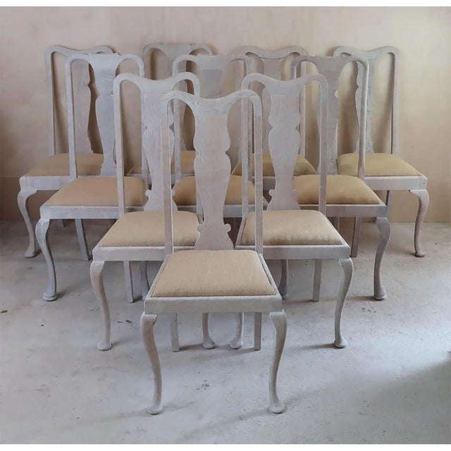 Recently limed. This is a harlequin set. It is made up from 3 near matching models ( 4 + 3 + 3 ). Re-upholstered in burlap...