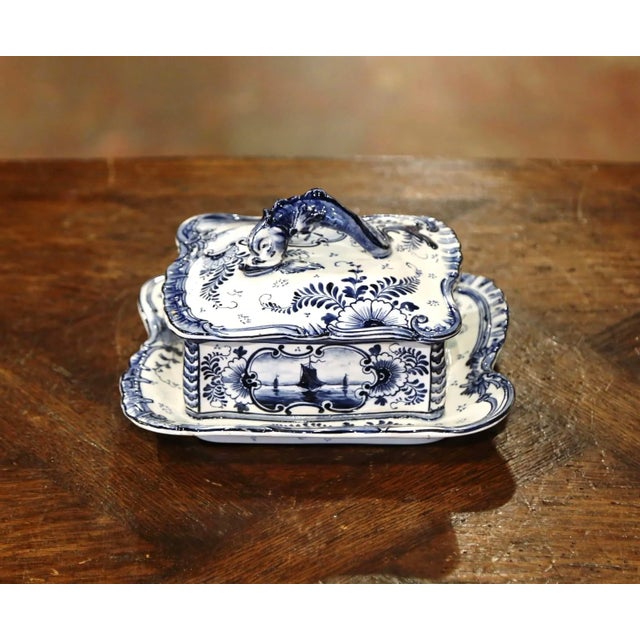 Crafted in Germany circa 1900 by Franz Anton Mehlem for Royal Bonn, this elegant antique faience serving dish is executed...