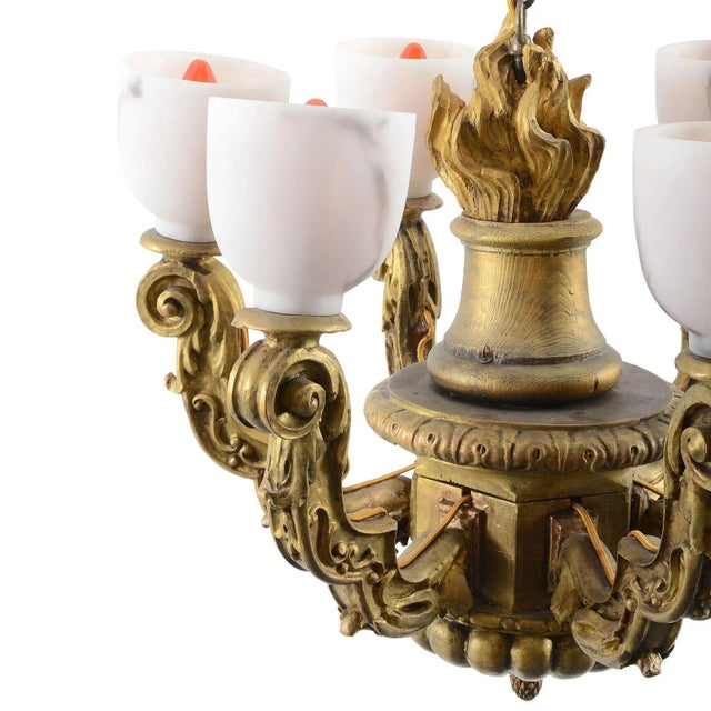 Antique Italian Art Nouveau gilt wood chandelier with six scroll design arms and alabaster shades, circa 1910. Dimensions...