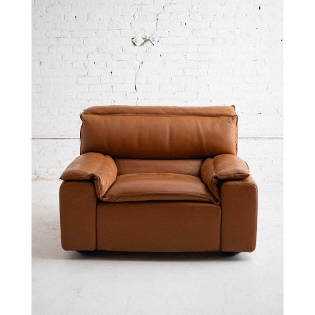 Mid-century armchair by Carlo Bartoli for Rossi di Albizzate, Italy 1970s. Original leather upholstery in cognac. Matching...