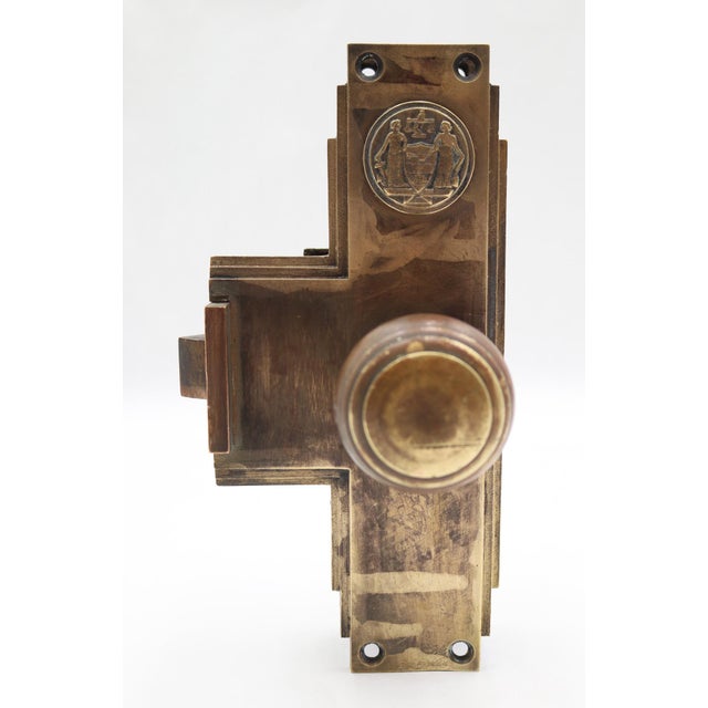 Art Deco style bronze monolock door knob set. Reclaimed by Olde Good Things from The Philadelphia Civic Center in 2005....