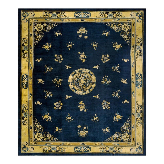Special Flowers Bordering a Medallion in the Center in a Navy Background Color Antique Chinese Peking Rug For Sale