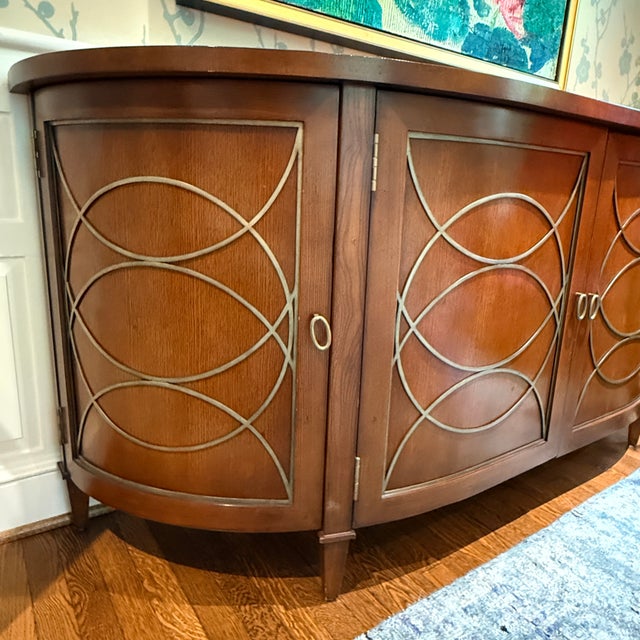 Hickory Chair Duchamp Sideboard This elongated take on a classic French demilune form features clean, smooth lines and...