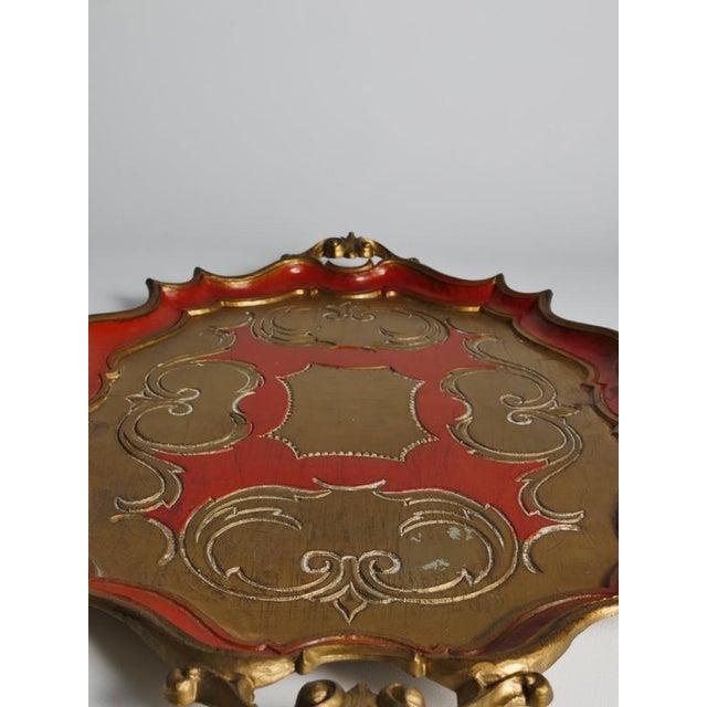 A striking mid-20th-century florentine tray in the traditional rococo style, produced in italy circa 1950–1970....