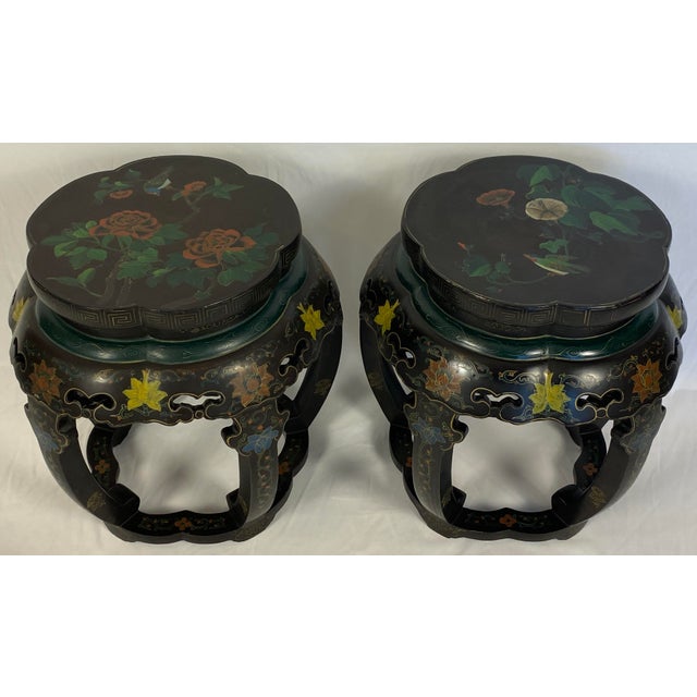 Elegant pair of Chinese hand painted and lacquered side tables. These very stylish chinoiserie tables have cabriole legs...