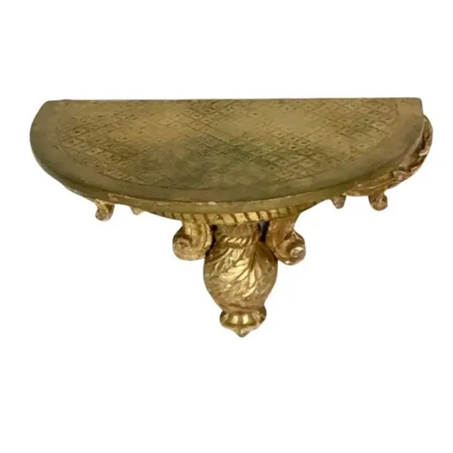 Pair of Italian carved and giltwood wall brackets. Beautifully hand-carved with acanthus leaves and scrollwork. Nice wide...