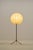 Beautiful mid-century tripod cocoon floor lamp from the 1960s. The shade, reminiscent of George Nelson's "bubble lamp,"...