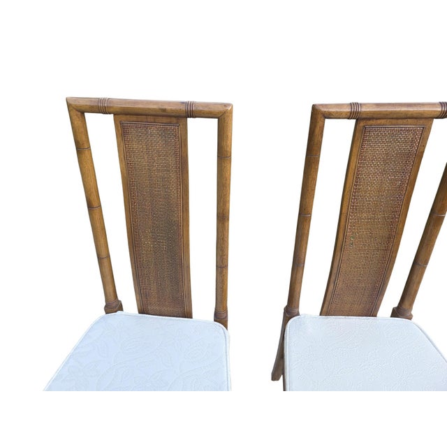 Great condition. Minor age related ware. Cane in one chair is damaged. See matching chairs in our store. Photos show some...